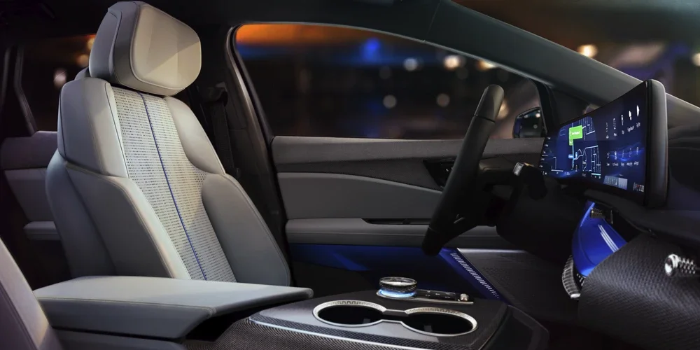 Passenger View of the 2027 Cadillac OPTIQ's Driver Side Seat and Dashboard