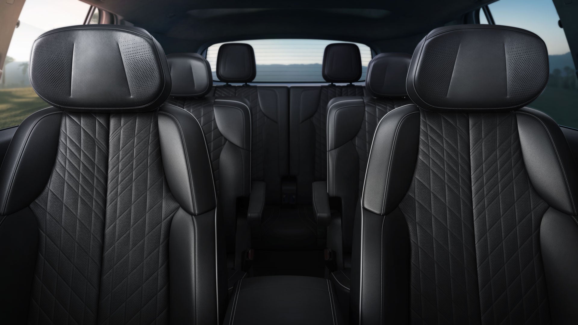 Dashboard view of the 2027 Cadillac VISTIQ's three rows of all-black seating